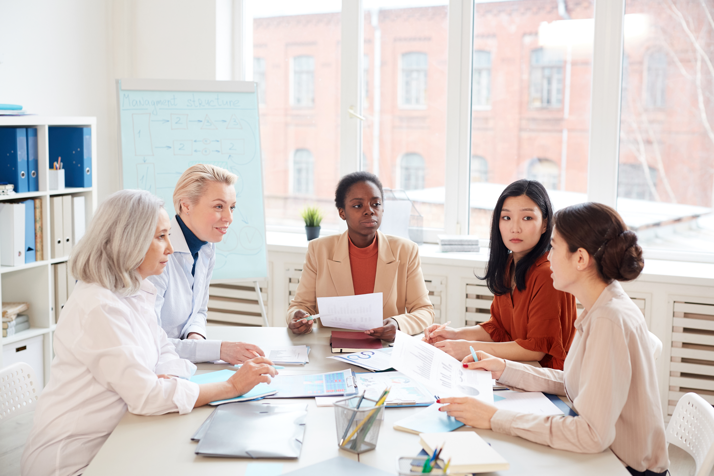 group-of-businesswomen-at-meeting-in-office